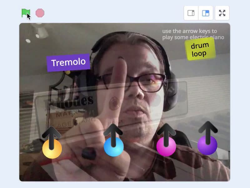 A person demoing the implementation of video sensing to JavaScript